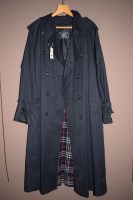 Lot 1231 - A Gentleman's navy trench coat, by Burberry...