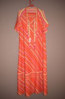 Lot 1237 - A 1970's kaftan dress, striped material with...