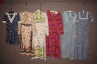 Lot 1241 - 1970's day dresses, by various designers, to...