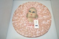 Lot 1269 - A 1920's pink ruffle pyjama case, the centre...