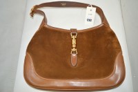 Lot 1282 - A tan leather and suede handbag, by Gucci,...