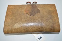 Lot 1287 - A 1930's/40's lizard skin clutch bag, bakelite...