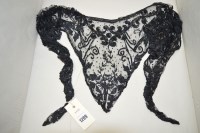 Lot 1289 - An early 20th Century black net and sequin...