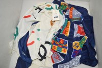 Lot 1294 - Two Chanel silk scarves, one cream ground the...