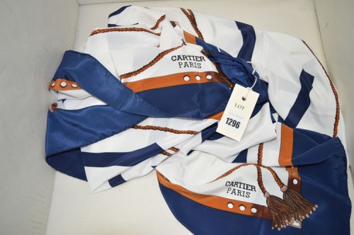 Lot 1296 - Two identical silk scarves by Cartier, with...