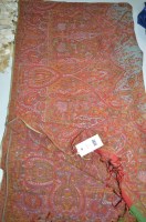 Lot 1297 - A Victorian woolen paisley shawl, turquoise...