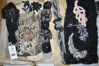 Lot 1300 - A 1920's black net, sequin and beadwork collar;...