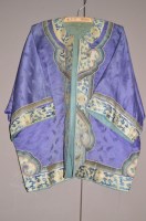 Lot 1305 - An early 20th Century Chinese silk jacket in...