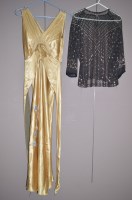 Lot 1309 - A 1930's gold coloured satin evening dress,...