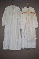 Lot 1318 - Two Victorian cream cotton night dresses;...