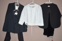 Lot 1322 - A black cape style jacket, by Victoria Beckham;...