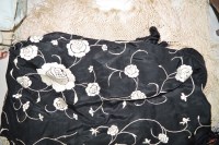 Lot 1332 - A 20th Century black silk shawl, with white...