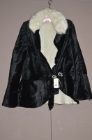 Lot 1349 - An early to mid 20th Century black velvet...