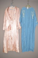 Lot 1350 - Two early 20th Century dressing gowns in blue...