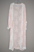 Lot 1351 - A 1920's silk and velvet peach coloured...