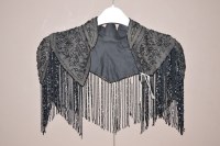 Lot 1352 - A Victorian black silk and beadwork shoulder...