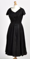 Lot 1362 - A Christian Dior 1950's black acetate cocktail...