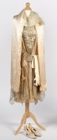 Lot 1374 - A cream and pale gold coloured 1920's silk...