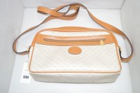 Lot 1394 - A Gucci style handbag in leather and canvas;...