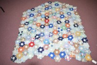 Lot 1460 - An unfinished 20th Century patchwork quilt,...