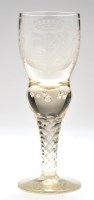 Lot 307 - 'Armorial' engraved glass goblet, having a...