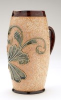 Lot 321 - Doulton Lambeth stoneware jug, of swelling...