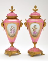 Lot 376 - Pair of pink ground giltmetal mounted...