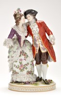 Lot 385 - A large porcelain figure group of courting...