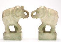 Lot 394 - Pair of carved hardstone figures of elephants,...