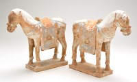 Lot 395 - Pair of Chinese terracotta horses, saddled and...