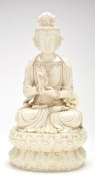 Lot 411 - Dehua style figure of Guanyin, seated in...