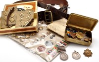 Lot 454 - A collection of military items, to include:...