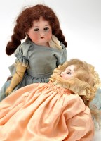 Lot 493 - A late 19th Century bisque head doll, by...