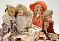 Lot 497 - Four 19th/early 20th Century wax head dolls,...