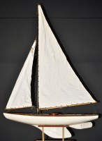 Lot 498 - An early 20th Century pond yacht, the wooden...