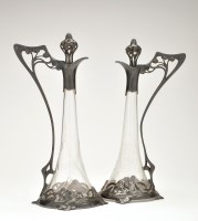 Lot 553 - A pair of WMF Art Nouveau style pewter and...