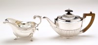 Lot 575 - A George V sauce boat, by Carrington & Co.,...