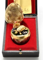 Lot 649 - An Elizabeth II silver gilt, silver and enamel...