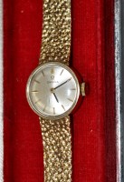 Lot 683 - A 9ct. gold lady's Omega cocktail watch, the...