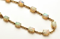 Lot 726 - An early 20th Century opal and yellow metal...