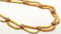 Lot 768 - A 14ct. gold and diamond fringe necklace,...