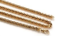 Lot 777 - A 9ct. gold necklace and two bracelets, all...