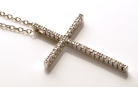 Lot 780 - A diamond set crucifix pendant, set throughout...