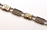 Lot 792 - A Chinese bracelet, made up of four white...