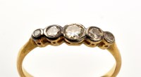 Lot 803 - A five stone diamond ring, the graduated old...