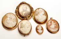 Lot 805 - A collection of cameo brooches, to include: a...