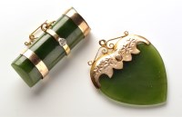 Lot 807 - A nephrite and yellow metal pendant, of heart...