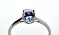 Lot 808 - A single stone tanzanite ring, the oval facet...