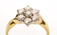 Lot 814 - A diamond cluster ring, the seven brilliant...