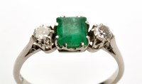 Lot 815 - An emerald and diamond ring, the central...